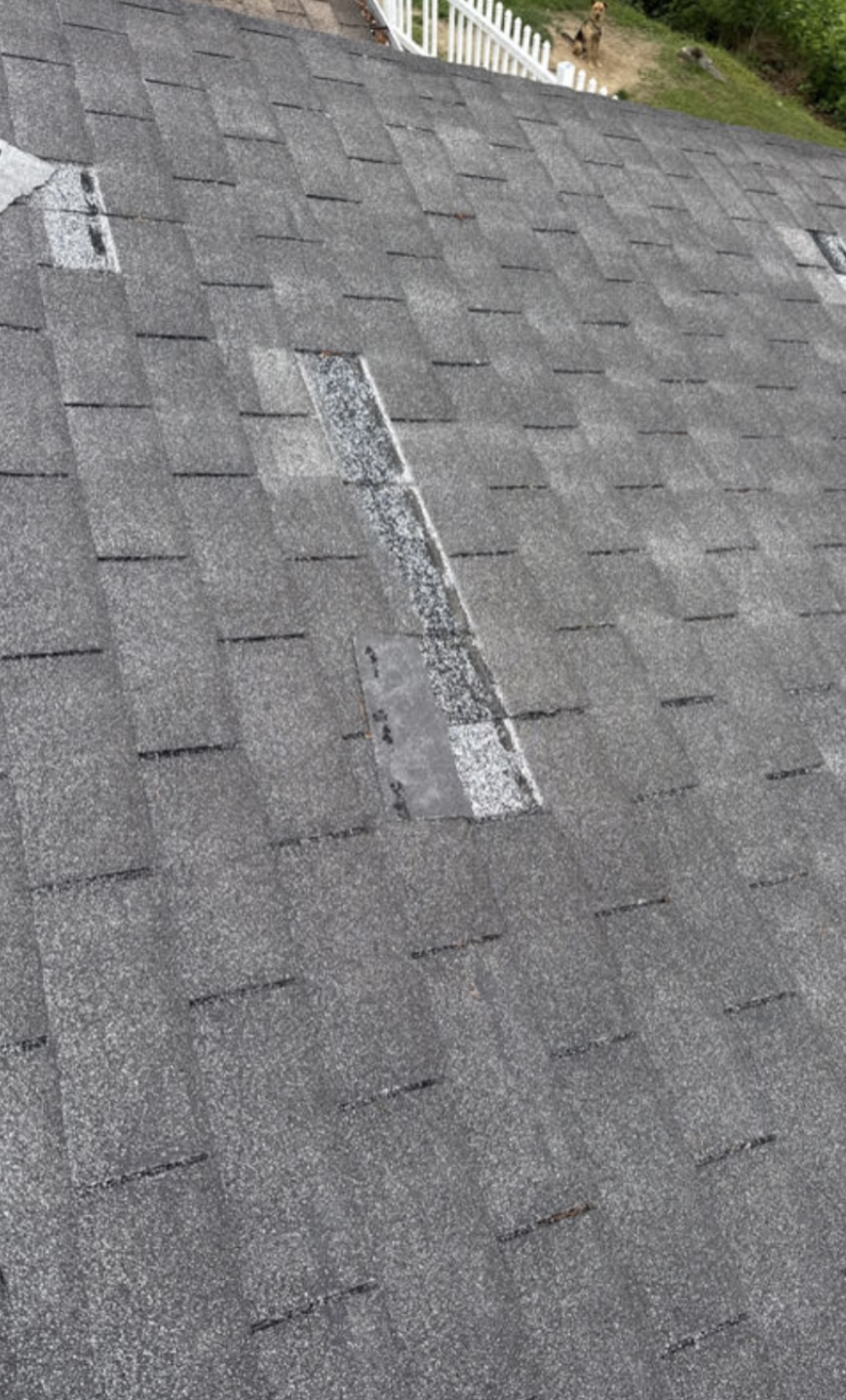 Damaged and patched shingles
